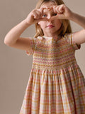 robe en coton bio à motif écossais smocké et brodé main