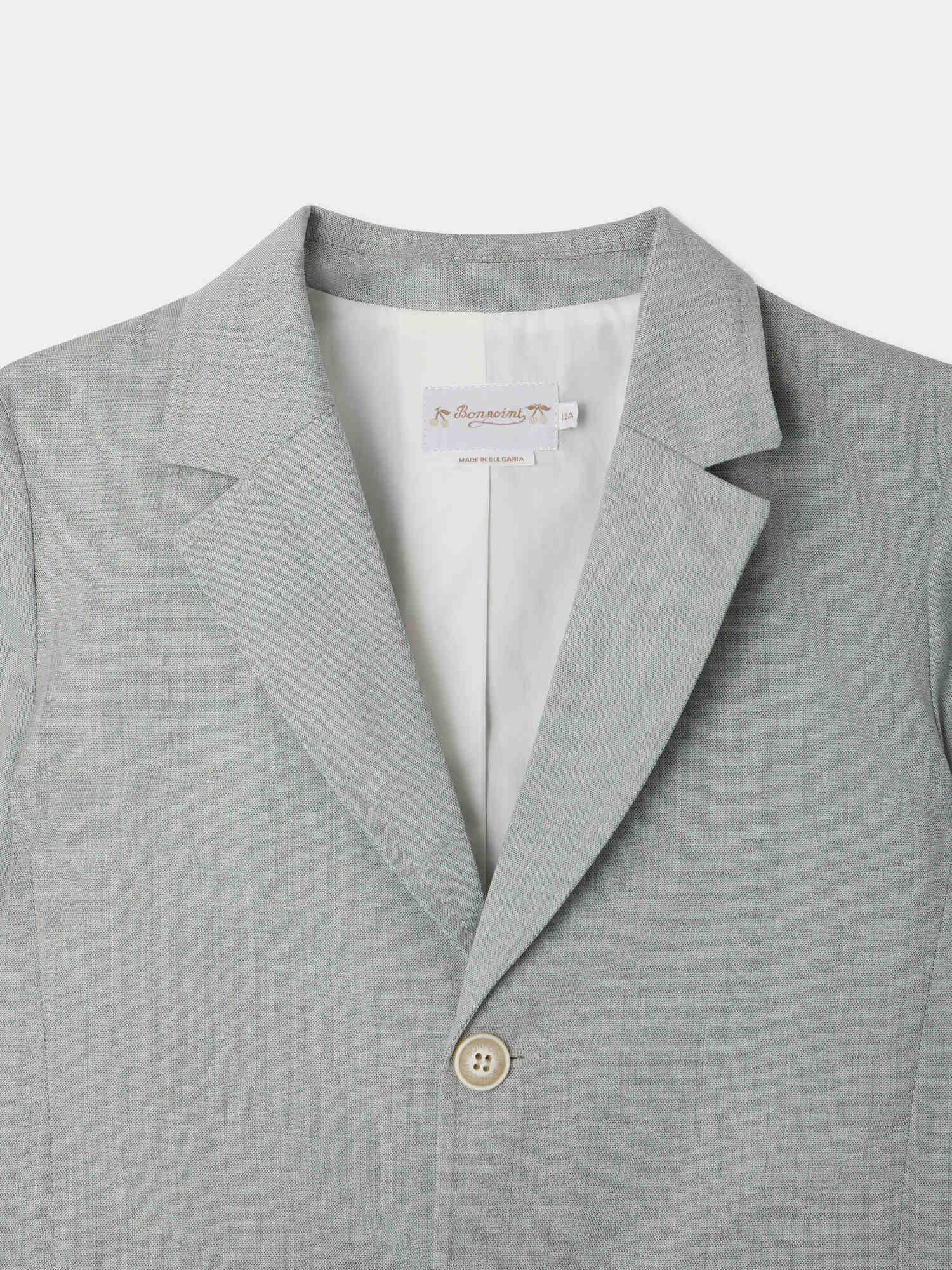 veste de costume sur mesure à revers crantés