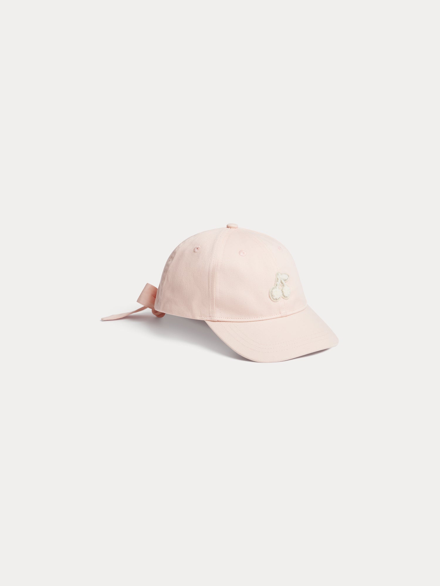 casquette nouée à l'arrière